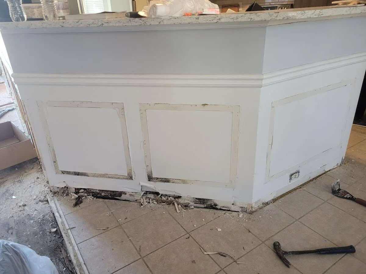 Water damage and mold on kitchen during Sewage Cleanup & Sanitation in Florida Ridge